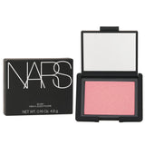 NARS Blush in Orgasm: a weightless, sheer blush that enhances all skin tones with a radiant, natural glow.