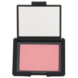 NARS Orgasm Blush in 4.8g features a weightless, radiant texture for a natural glow, perfect for all skin tones.