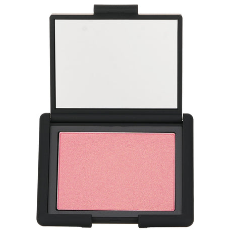 NARS Orgasm Blush in 4.8g features a weightless, radiant texture for a natural glow, perfect for all skin tones.