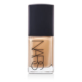 NARS Sheer Glow Foundation in Santa Fe, 30ml, offers buildable coverage for a radiant, even complexion. Ideal for dry skin.