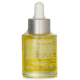 Clarins Face Treatment Oil - Lotus for oily/combo skin, 30ml, nourishes, tightens pores, and balances complexion for radiant skin.