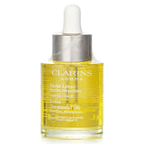 Clarins Face Treatment Oil - Lotus in 30ml bottle, ideal for oily skin, regulates sebum and tightens pores.