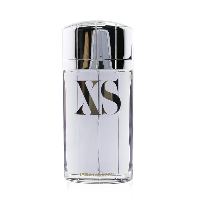 Paco Rabanne XS Eau De Toilette Spray in a 100ml bottle, featuring a bold woody floral musk scent for men.