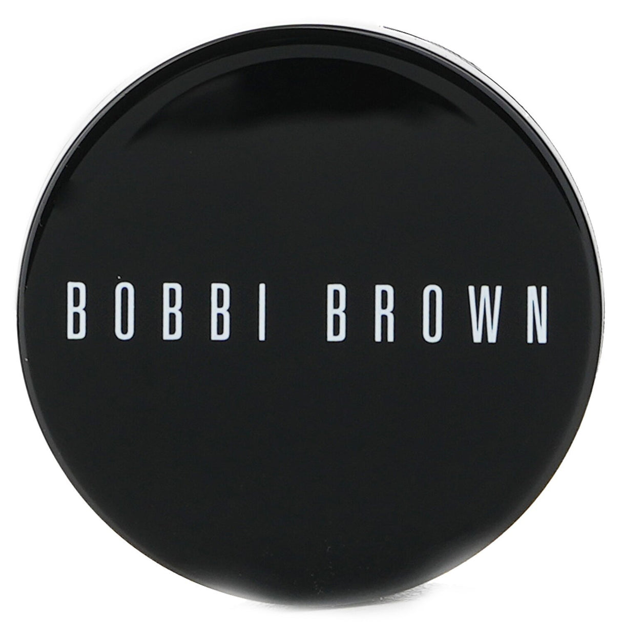 Bobbi Brown Light Bisque Corrector in 1.4g, a creamy, waterproof formula that conceals dark circles and brightens the undereye area.