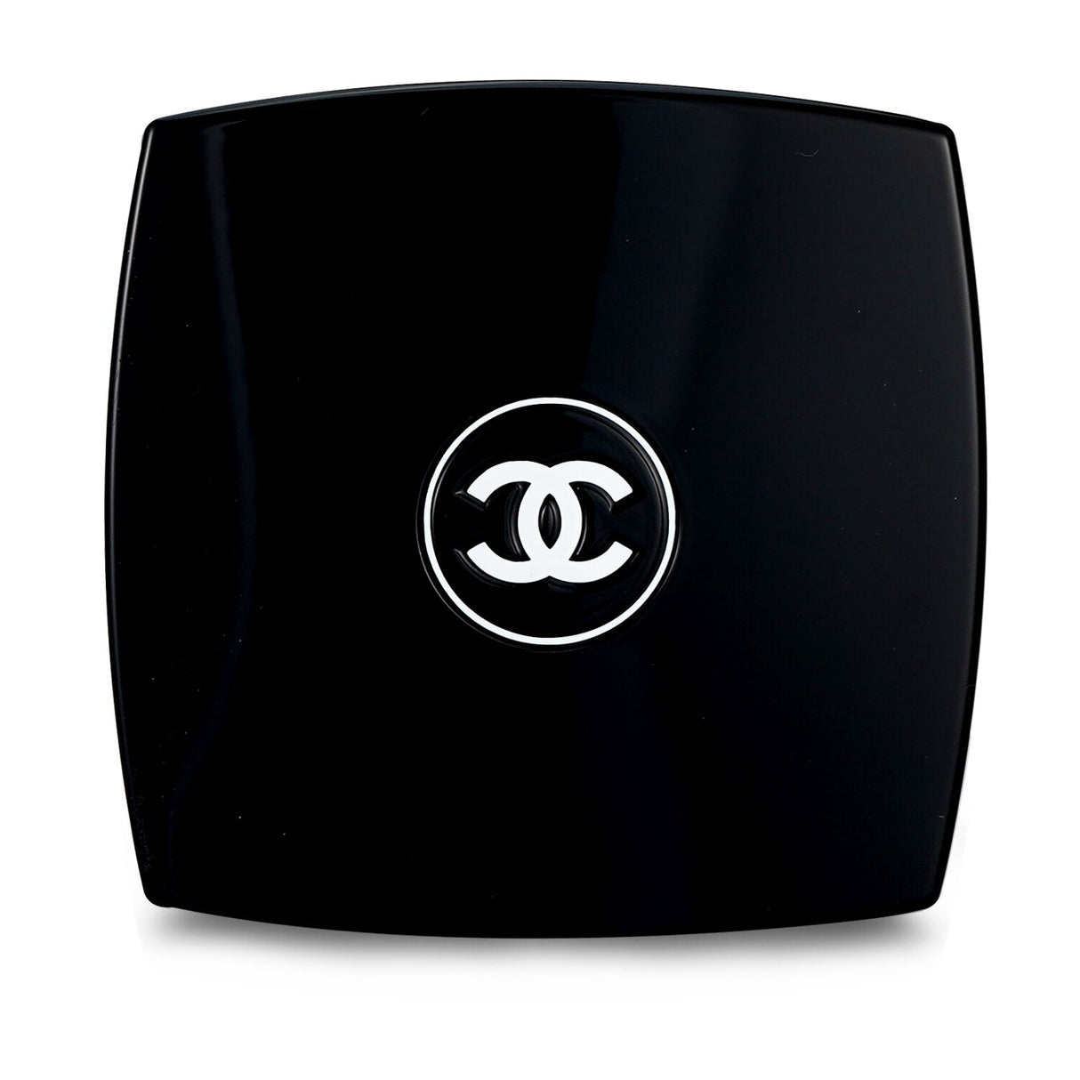 Luxurious Chanel Powder Blush No. 71 Malice, vibrant color, smooth texture, includes deluxe brush for easy application.