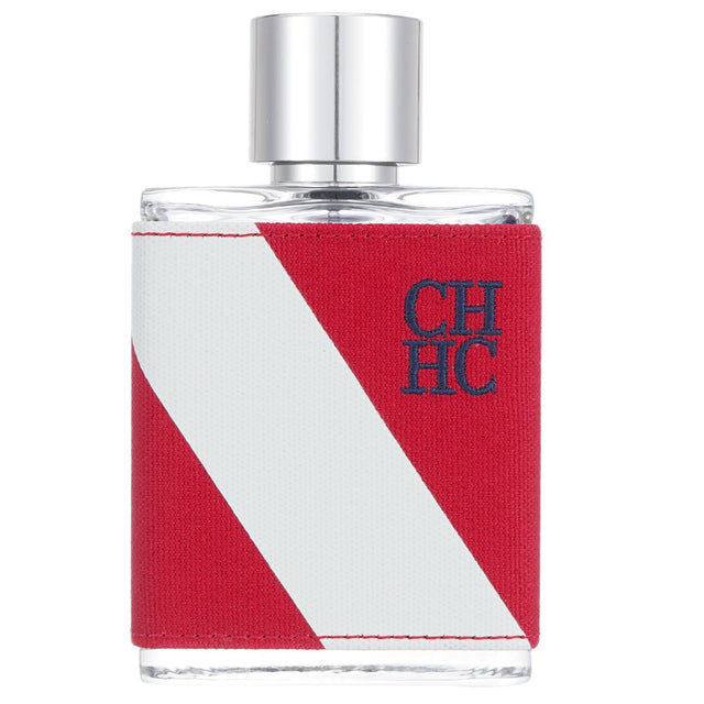 Carolina Herrera CH Sport Eau De Toilette Spray in 100ml, featuring spicy woody notes, perfect for confident modern men.