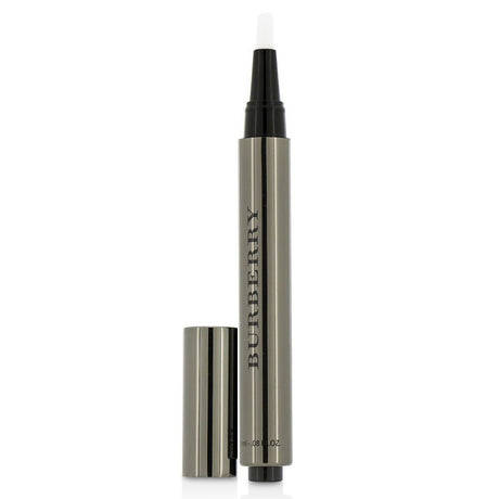 Lightweight Burberry No. 03 Rosy Beige concealer in brush-pen for flawless, radiant coverage of dark circles and imperfections.