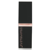 Youngblood Blushing Nude Lipstick in elegant packaging, offering long-lasting color and a smooth, moisturizing finish.