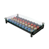 Sleek Avanti Coffee Capsule Holder for up to 40 capsules, featuring a sliding drawer and tempered glass top for easy access.