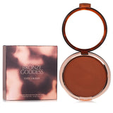 Estee Lauder Bronze Goddess Powder Bronzer in #04 Deep for a sun-kissed glow, lightweight, oil-free, and travel-friendly.