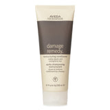 Aveda Damage Remedy Restructuring Conditioner in new packaging, 200ml, revitalizes damaged hair with deep hydration and strength.