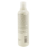 Aveda Damage Remedy Shampoo: 250ml revitalizing formula strengthens damaged hair with coconut and quinoa protein for vibrant health.