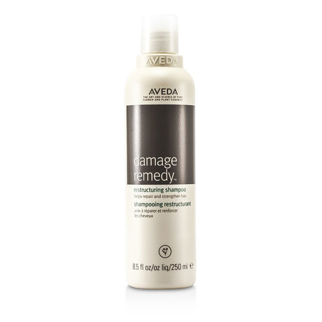 Aveda Damage Remedy Shampoo 250ml revitalizes damaged hair with a coconut-based formula and quinoa protein for strength and shine.