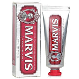 Travel-sized Marvis Cinnamon Mint Toothpaste (25ml) offers a creamy blend of peppermint and cinnamon for fresh, protected teeth.