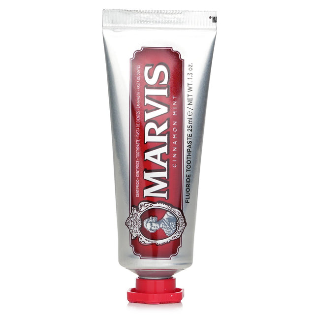 Travel-sized Marvis Cinnamon Mint Toothpaste (25ml) combines refreshing peppermint and warm cinnamon for effective oral care.