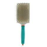 Moroccanoil Ionic Ceramic Thermal Paddle Brush with ionic technology for sleek, frizz-free hair and reduced drying time.