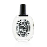 Bottle of Diptyque Tam Dao Eau De Toilette Spray, a floral woody musk fragrance, perfect for any occasion, 100ml.