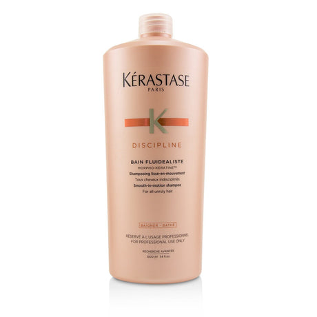 Kerastase Discipline shampoo for unruly hair, delivering smoothness, shine, and frizz control in a luxurious lather.