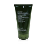 Gentle, milky face cleanser with mushroom blend for soothing sensitive skin, removes makeup while maintaining hydration.