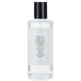 Demeter Atmosphere Diffuser Oil in Dirt scent, 120ml, creates a serene, earthy ambiance for lasting tranquility.