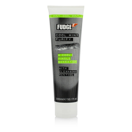 Fudge Cool Mint Purify Conditioner (300ml) revitalizes hair with a refreshing minty tingle, soothing scalp and preventing aging.