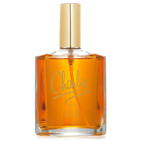 Revlon Charlie Gold Eau De Toilette Spray 100ml: a seductive oriental floral fragrance with notes of orange, cinnamon, and sandalwood.