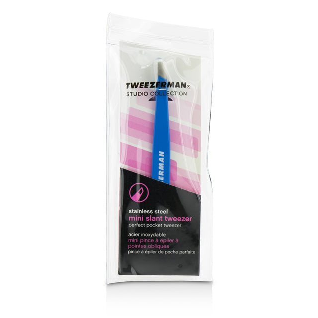 Bahama Blue Mini Slant Tweezer by Tweezerman, portable with precision tips for flawless grooming on-the-go.