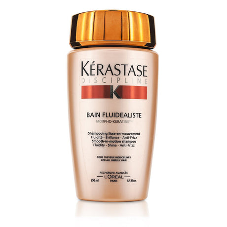 Kerastase Discipline Bain Fluidealiste shampoo for unruly hair, offering smoothness, anti-frizz benefits, and luxurious lather.