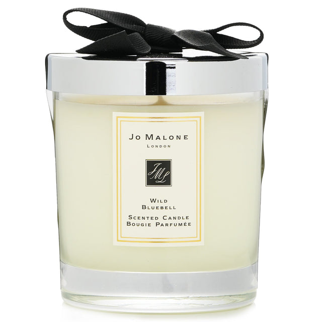 Jo Malone Wild Bluebell Scented Candle, 200g, fills your space with a serene floral aroma, enhancing relaxation for 45 hours.