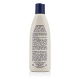 Soothing body wash for newborns, with a tearless, hypoallergenic formula for sensitive skin, enriched with milk protein and vitamins.