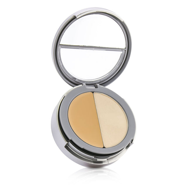 Cargo Double Agent Concealing Kit in 3W Medium, featuring a balmy concealer and soft powder for flawless, natural skin.