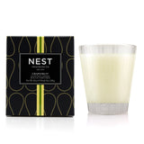 Luxurious Nest grapefruit scented candle, 230g, offers a zesty fragrance, clean burn, and lasts up to 50 hours for relaxation.