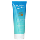 Luxurious shimmering body cream for intense hydration and enhanced tan, featuring Thermal Plankton for glowing skin.