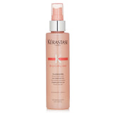 Kerastase Discipline Fluidissime spray for unruly hair, offers anti-frizz, heat protection, and shine for smooth, manageable locks.