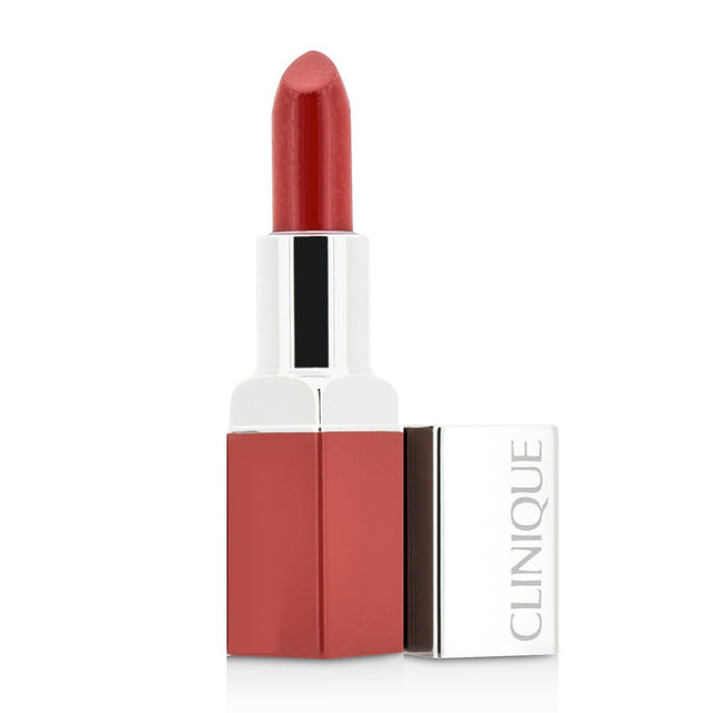 Clinique Pop Lip Colour + Primer in #06 Poppy Pop, a lightweight lipstick offering intense color and hydration with a velvety finish.