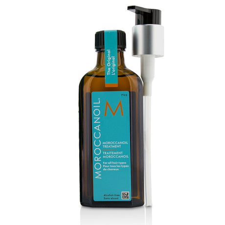 Moroccanoil Treatment 100ml: oil-infused hair care for all types, reduces frizz, enhances shine with argan oil and vitamins.