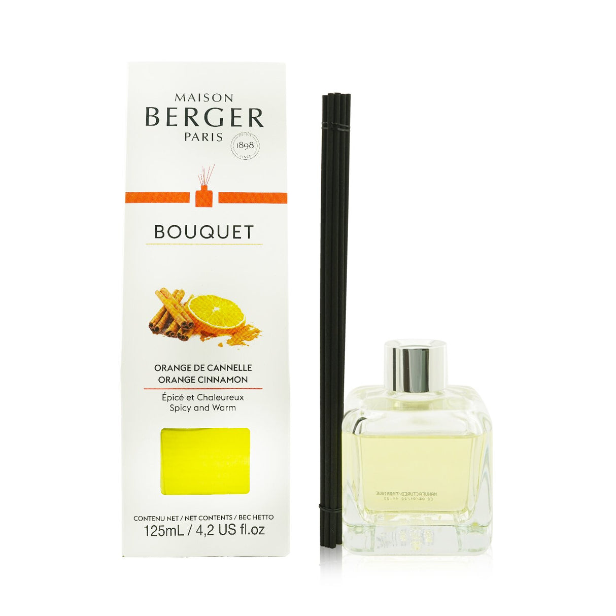 Elegant glass cube diffuser with Orange Cinnamon scent, featuring engineered polymer sticks for optimal fragrance diffusion.