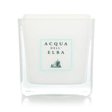 Acqua Dell'Elba scented candle in Note Di Natale, 180g; features festive aroma for cozy ambiance and long burn time.