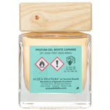 Elegant glass home fragrance diffuser with a wooden cap, delivering refreshing scents inspired by the Italian landscape.