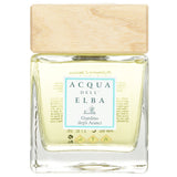 Elegant glass diffuser with wooden cap, emitting a refreshing citrus scent of an orange garden in 500ml/17oz.