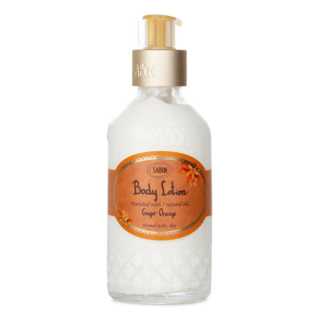 Luxurious 200ml Ginger Orange body lotion with moisturizing natural oils, uplifting scent, and convenient pump dispenser.
