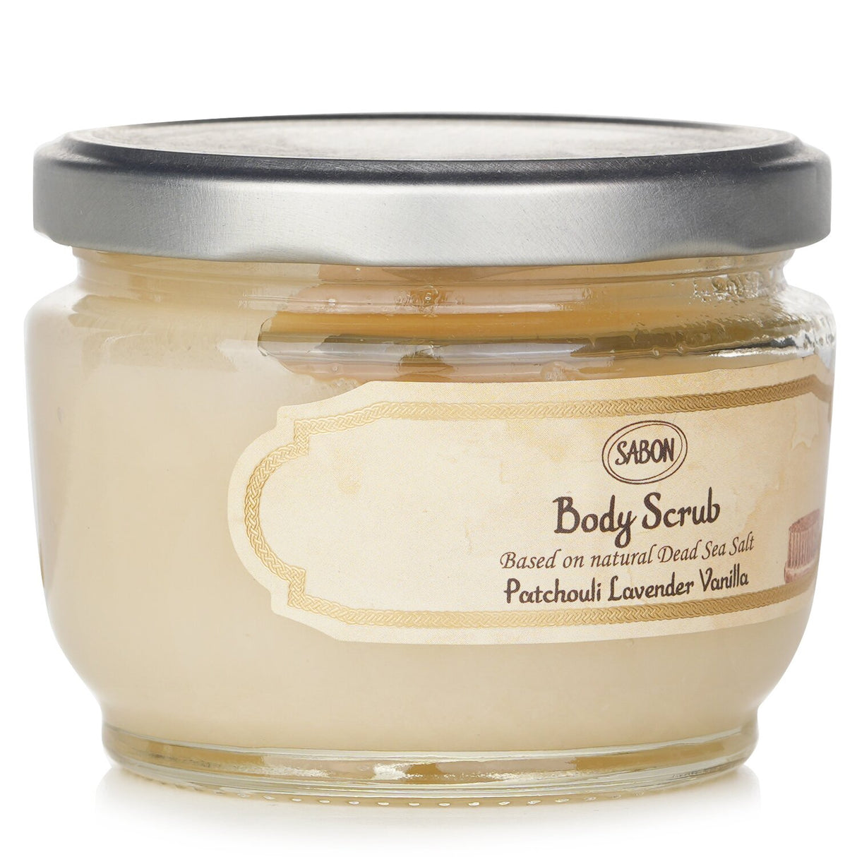 Luxury body scrub with Dead Sea salt, nourishing oils, and tranquil patchouli lavender vanilla scent for soft, radiant skin.