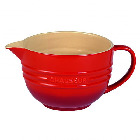 Vibrant red 1.5L mixing jug made of durable stoneware, safe for oven, microwave, and freezer use, perfect for batters and sauces.