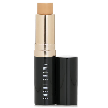 Bobbi Brown Skin Foundation Stick #2.5 Warm Sand in a sleek 9g design, offering a lightweight, creamy texture for flawless coverage.