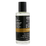 Demeter Cinnamon Bark Bath & Body Oil in a 60ml bottle, infused with nourishing oils and a warm cinnamon scent.