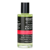 Luxurious 60ml massage oil with a Cosmopolitan scent, featuring natural ingredients for skin nourishment and hydration.