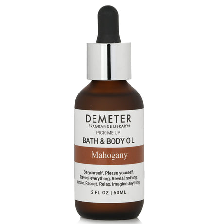 Luxurious Demeter Mahogany Bath & Body Oil in a 60ml bottle, scented with mahogany and spices, for deep hydration and soothing care.