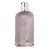 Luxurious 300ml bath & shower gel infused with rhubarb and rose for a moisturizing, invigorating experience.