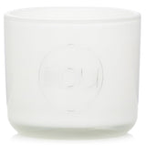 Eco-Luxury Aromacology Candle in glass, infused with coconut and lime scents, creating a joyful ambiance for up to 50 hours.