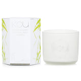 Eco-luxury candle in glass, featuring Green Tea and Cherry Blossom scents, for a calming, eco-friendly ambiance.
